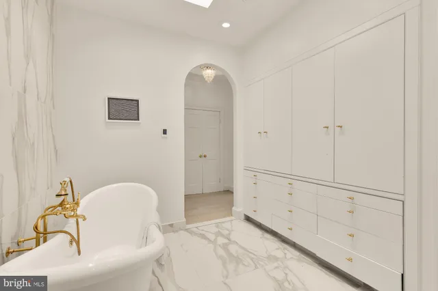 a bathroom with a mirror and a shower