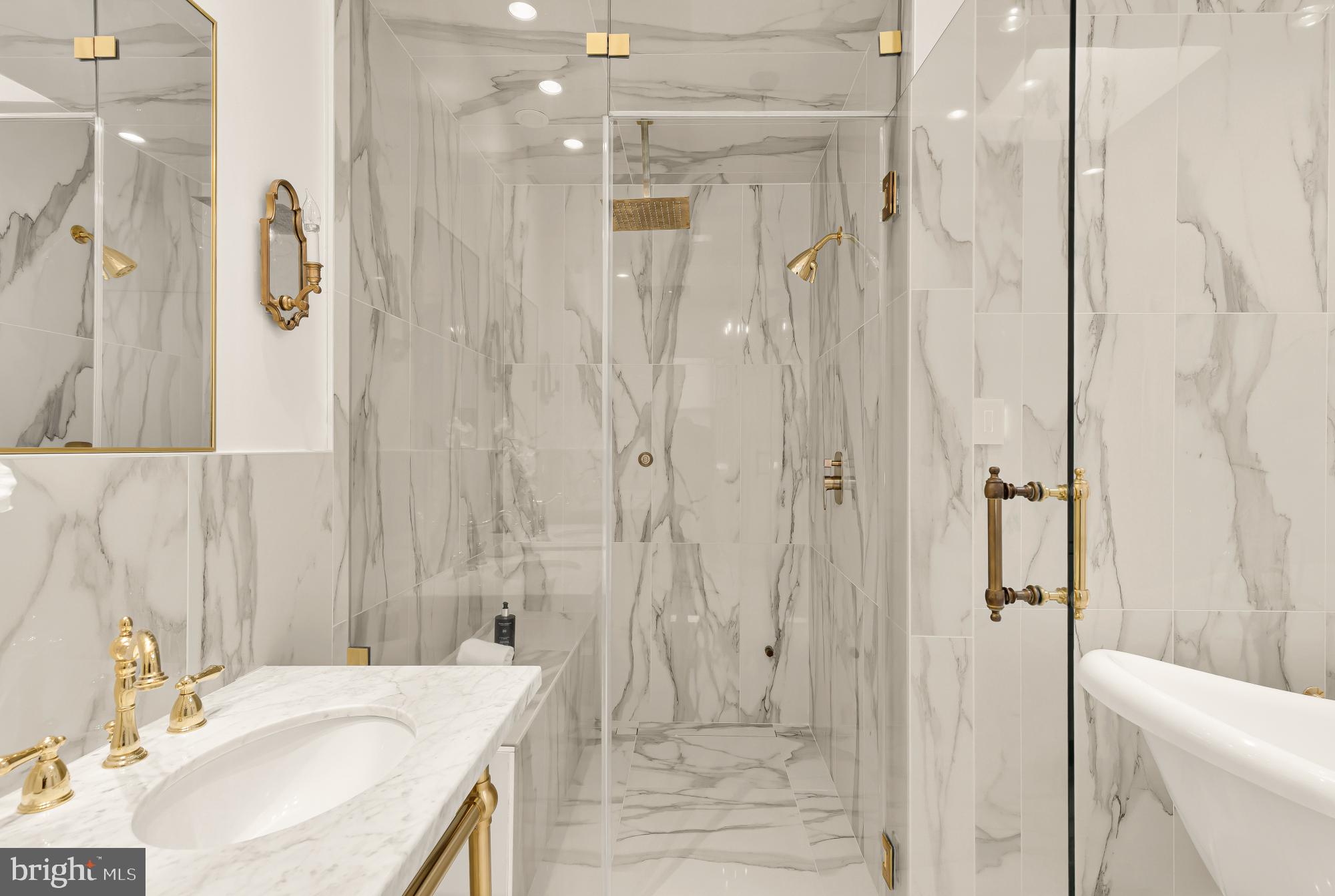 3249 P Street Northwest Washington, DC 20007 - Photo 28 of 59 a bathroom with a sink a toilet and shower