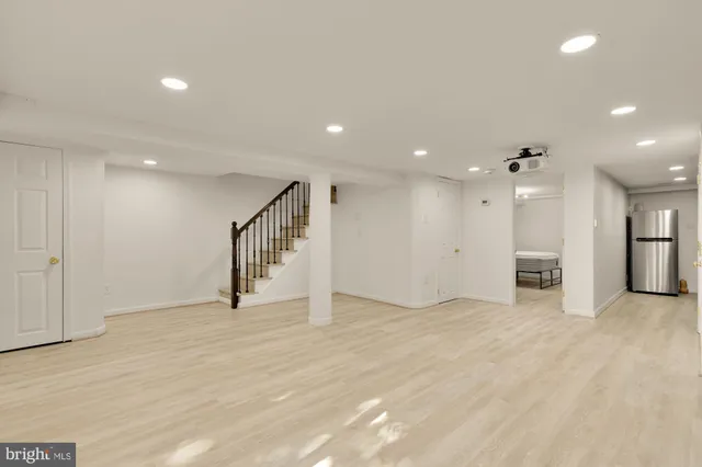 a kitchen with a sink and a stove top oven