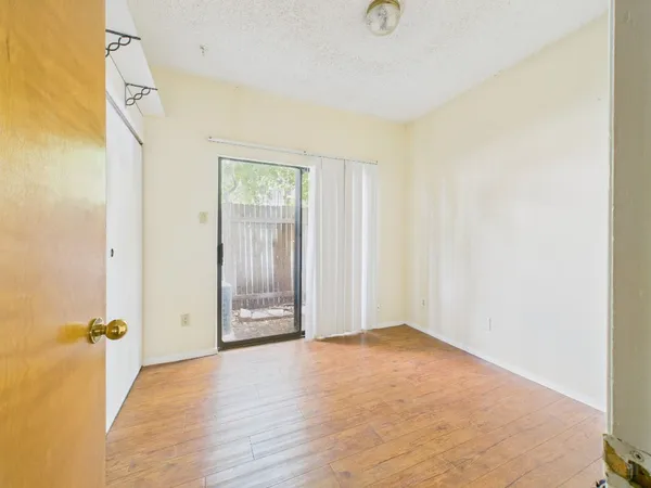 an empty room with windows