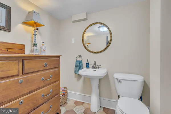 a close view of a utility room with dryer and washer