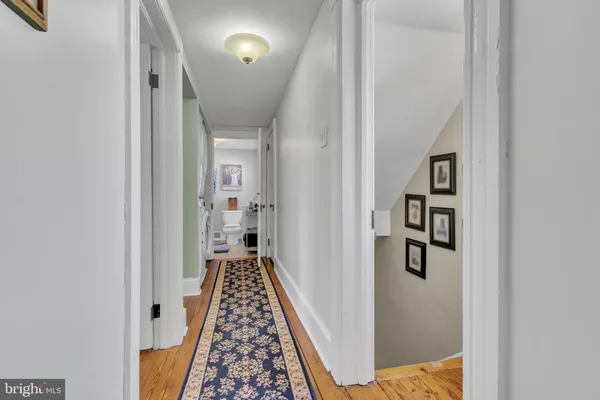 a view of a room with window and cabinet