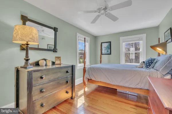 a workspace with furniture and wooden floor