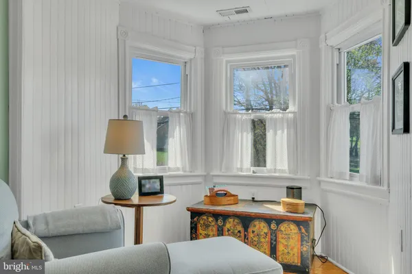a view of a house with a yard and plants