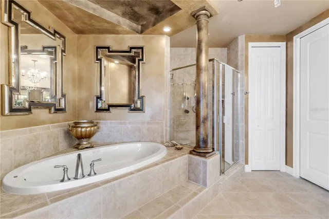 a bedroom with two beds and a window