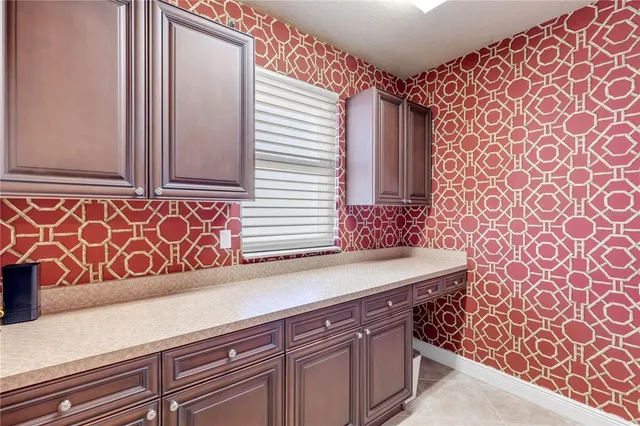 a view of balcony with seating space and ocean view