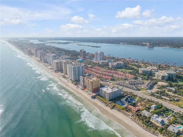 a living room with furniture gym equipment and a window