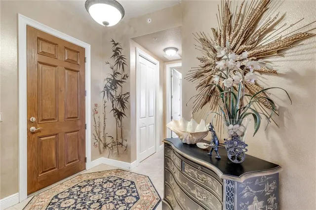 a large open kitchen with kitchen island granite countertop a large counter top stainless steel appliances and cabinets