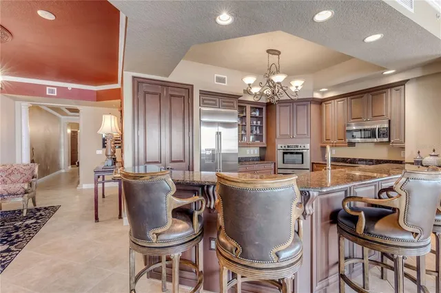 a kitchen with granite countertop lots of counter top space