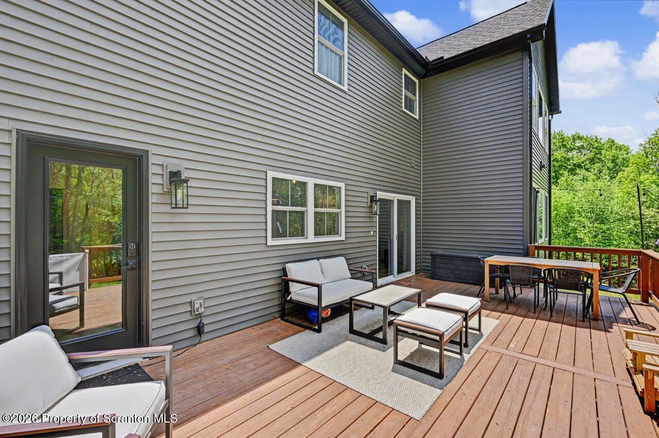 100 Highland Road Moscow, PA 18444 - Photo 77 of 85 a backyard of a house with seating space