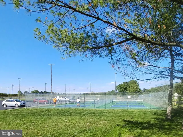 a view of street along with trees