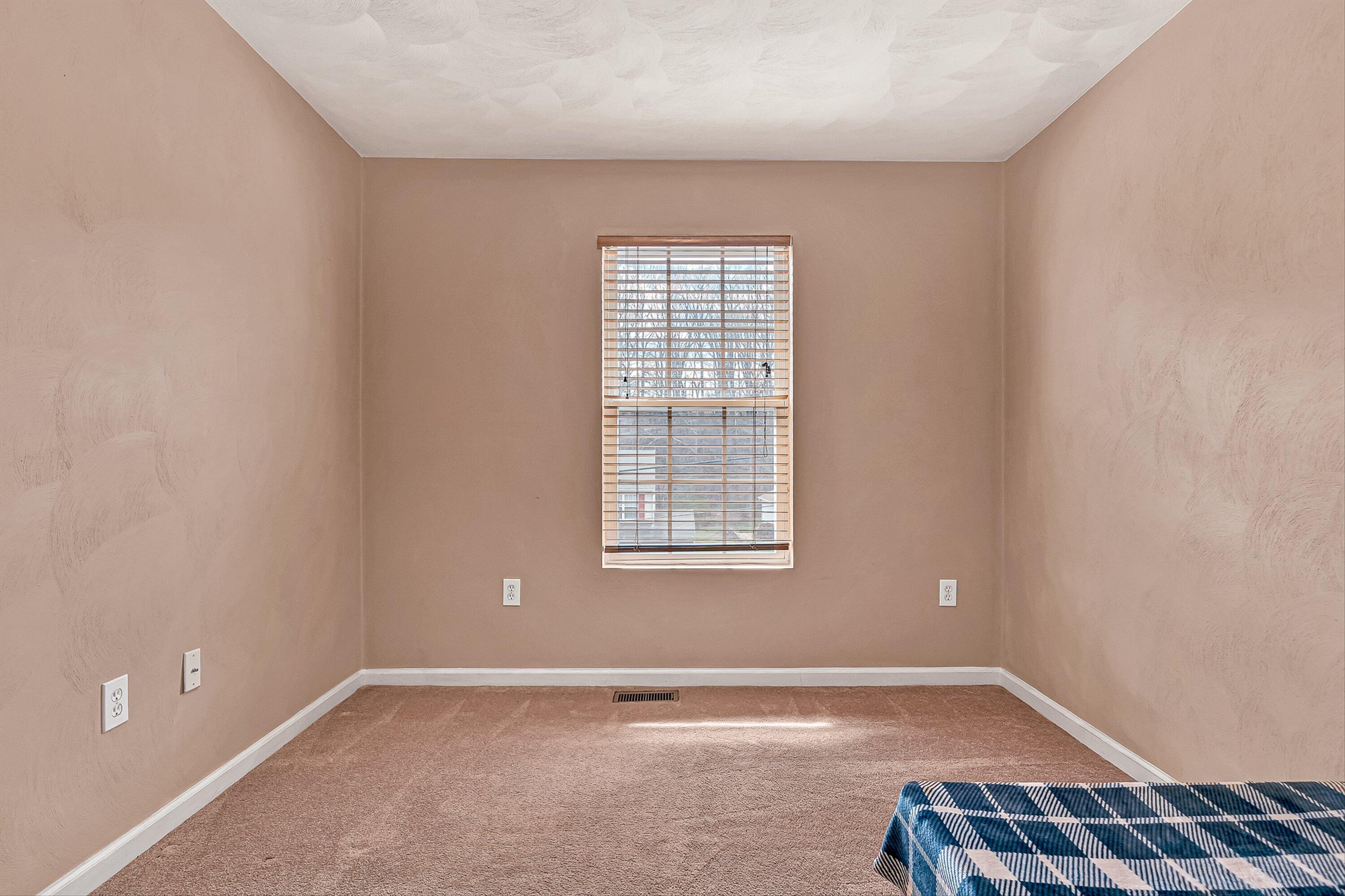 4219 Daugherty Road Salem, VA 24153 - Photo 12 of 28 an empty room with a window
