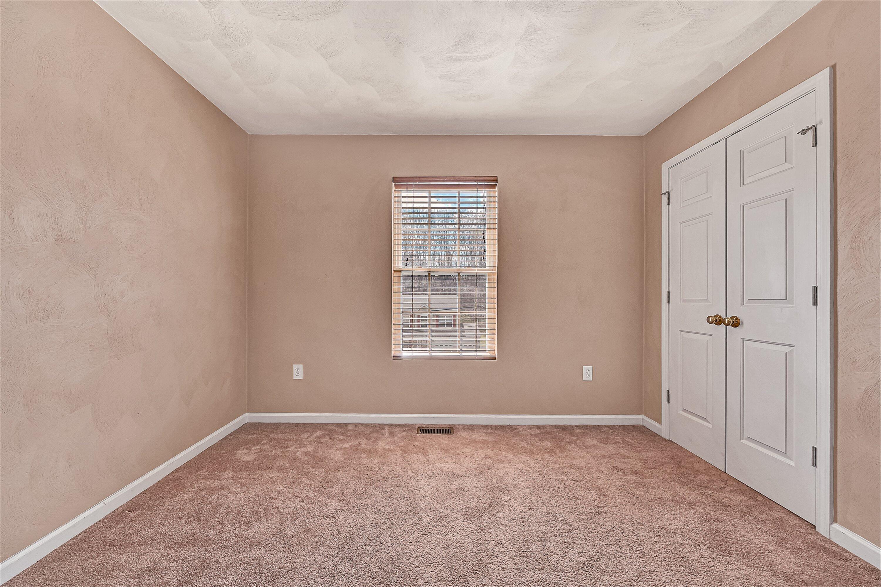 4219 Daugherty Road Salem, VA 24153 - Photo 14 of 28 a view of an empty room with a window