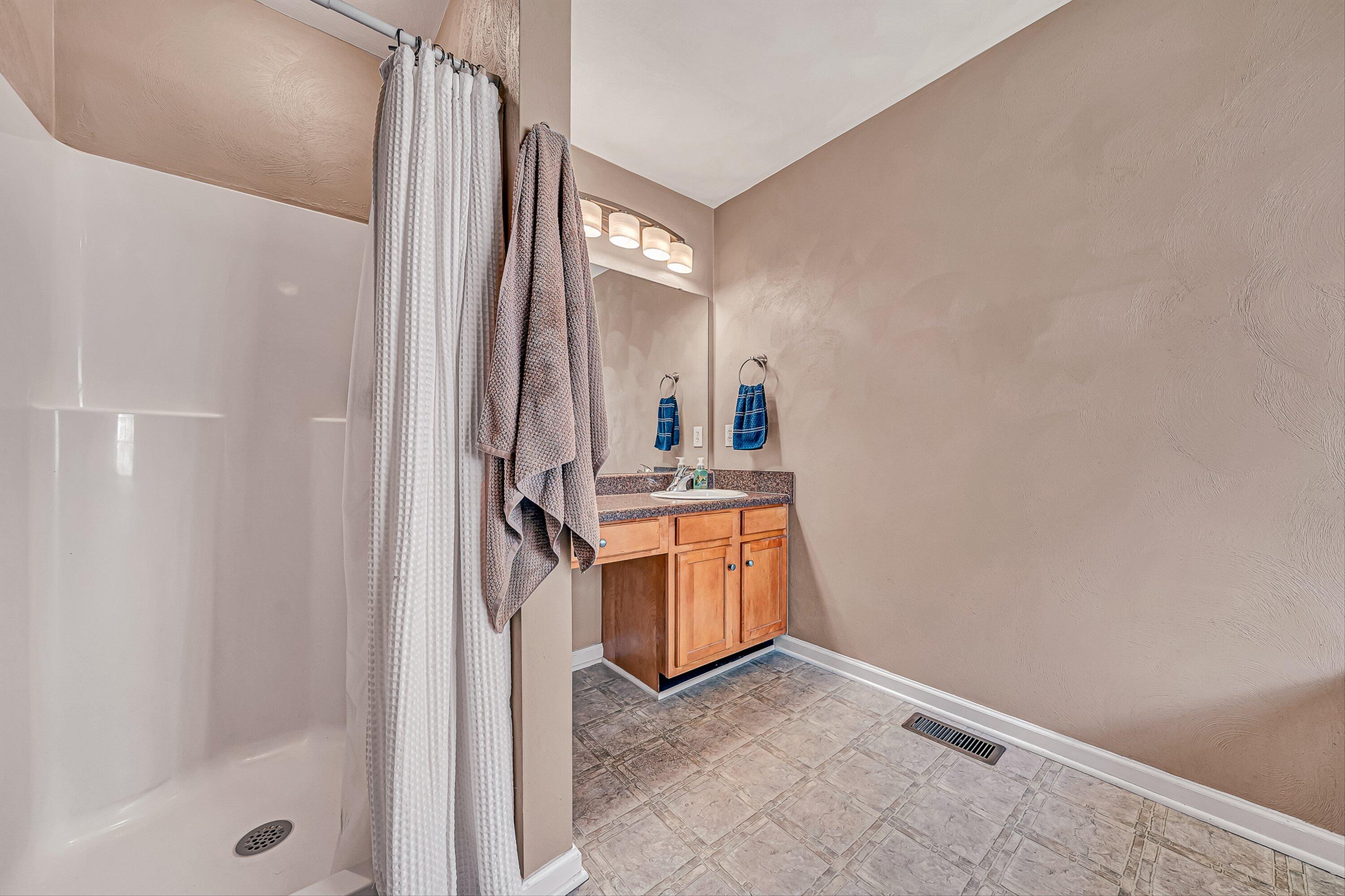 4219 Daugherty Road Salem, VA 24153 - Photo 18 of 28 a bathroom with a sink and mirror