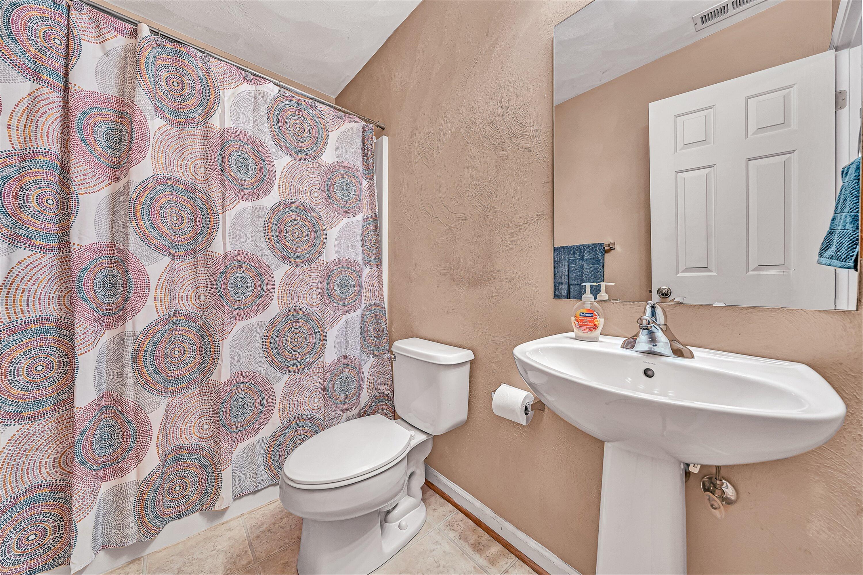 4219 Daugherty Road Salem, VA 24153 - Photo 25 of 28 a bathroom with a sink and a toilet