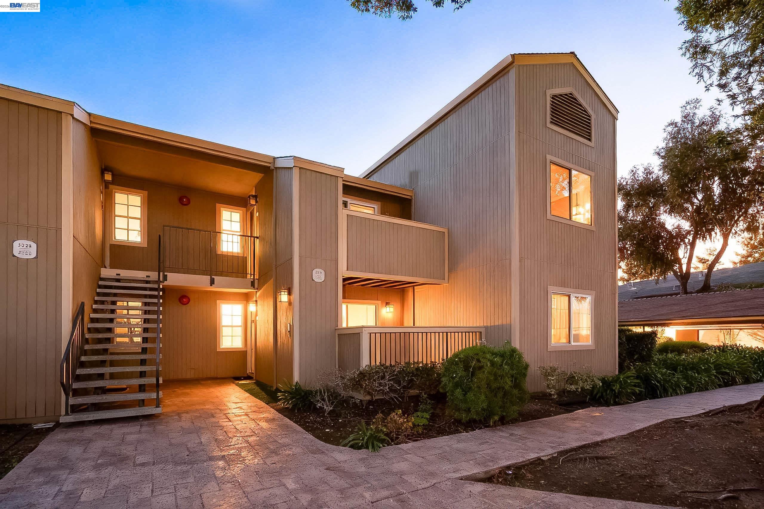 3232 Red Cedar Terrace Fremont, CA 94536 - Photo 1 of 1 a front view of a house with a yard