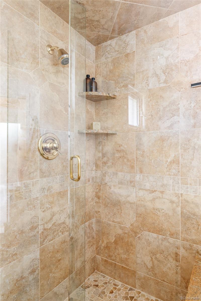 3095 Crabapple Road Golden, CO 80401 - Photo 26 of 50 a bathroom with a shower