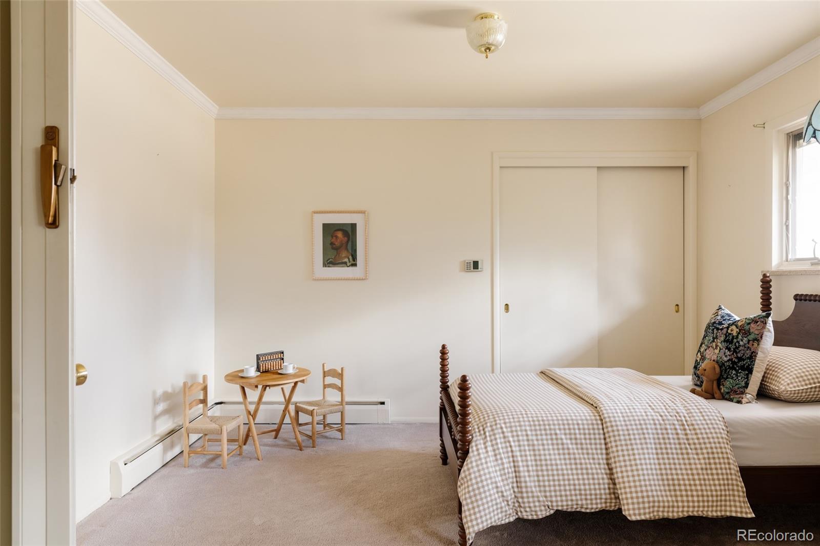 3095 Crabapple Road Golden, CO 80401 - Photo 35 of 50 a bedroom with a bed and a window
