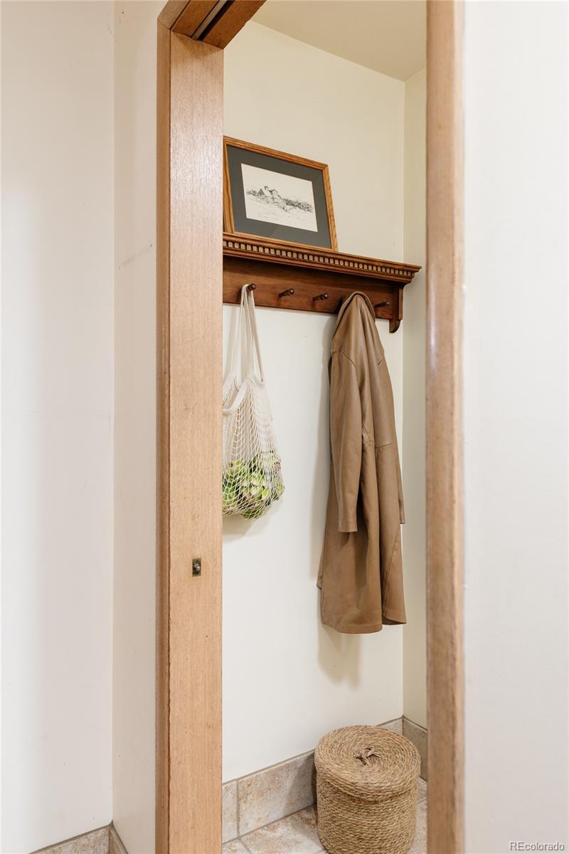 3095 Crabapple Road Golden, CO 80401 - Photo 37 of 50 a picture of a bathroom with a shower and a mirror