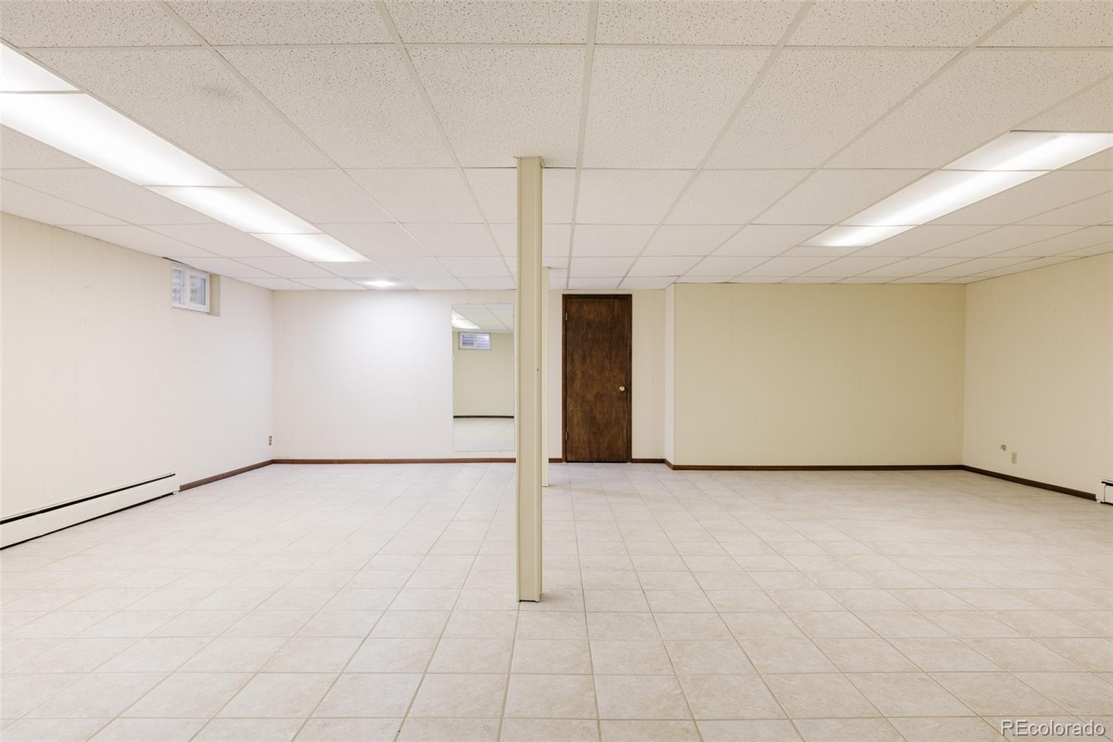 3095 Crabapple Road Golden, CO 80401 - Photo 39 of 50 a view of an empty room with a window