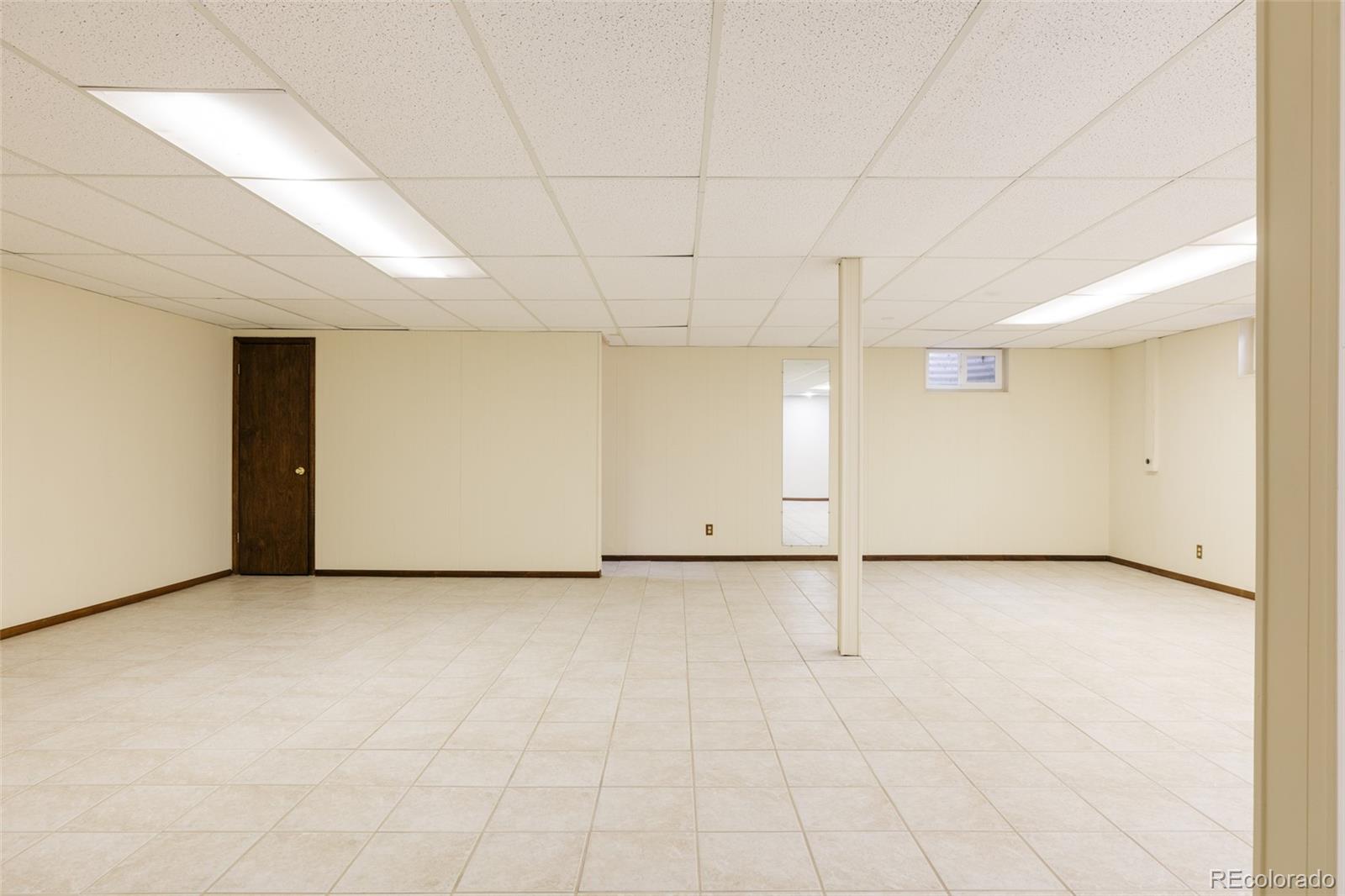 3095 Crabapple Road Golden, CO 80401 - Photo 40 of 50 an empty room with windows
