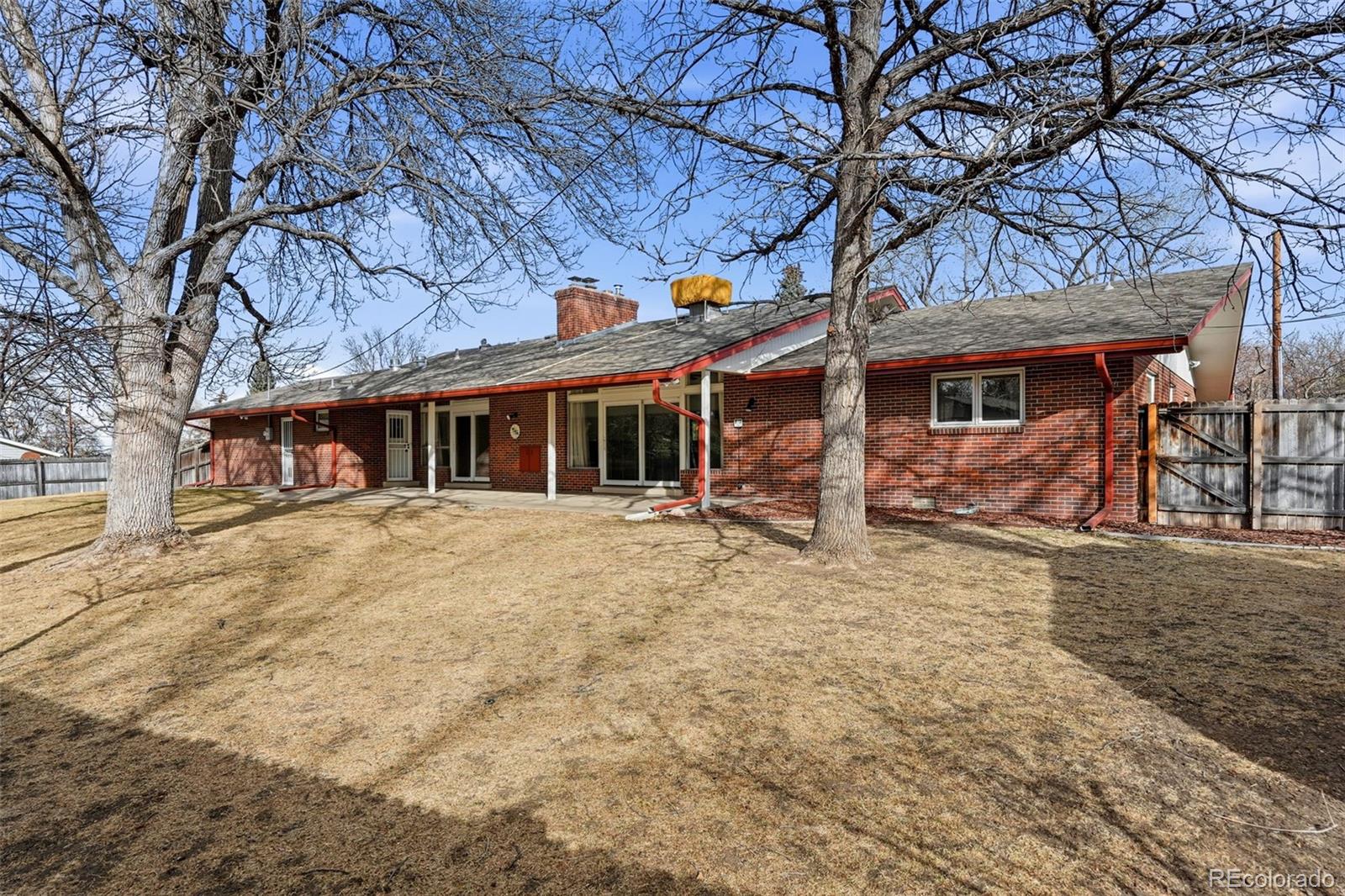 3095 Crabapple Road Golden, CO 80401 - Photo 42 of 50 front view of a house with a large tree