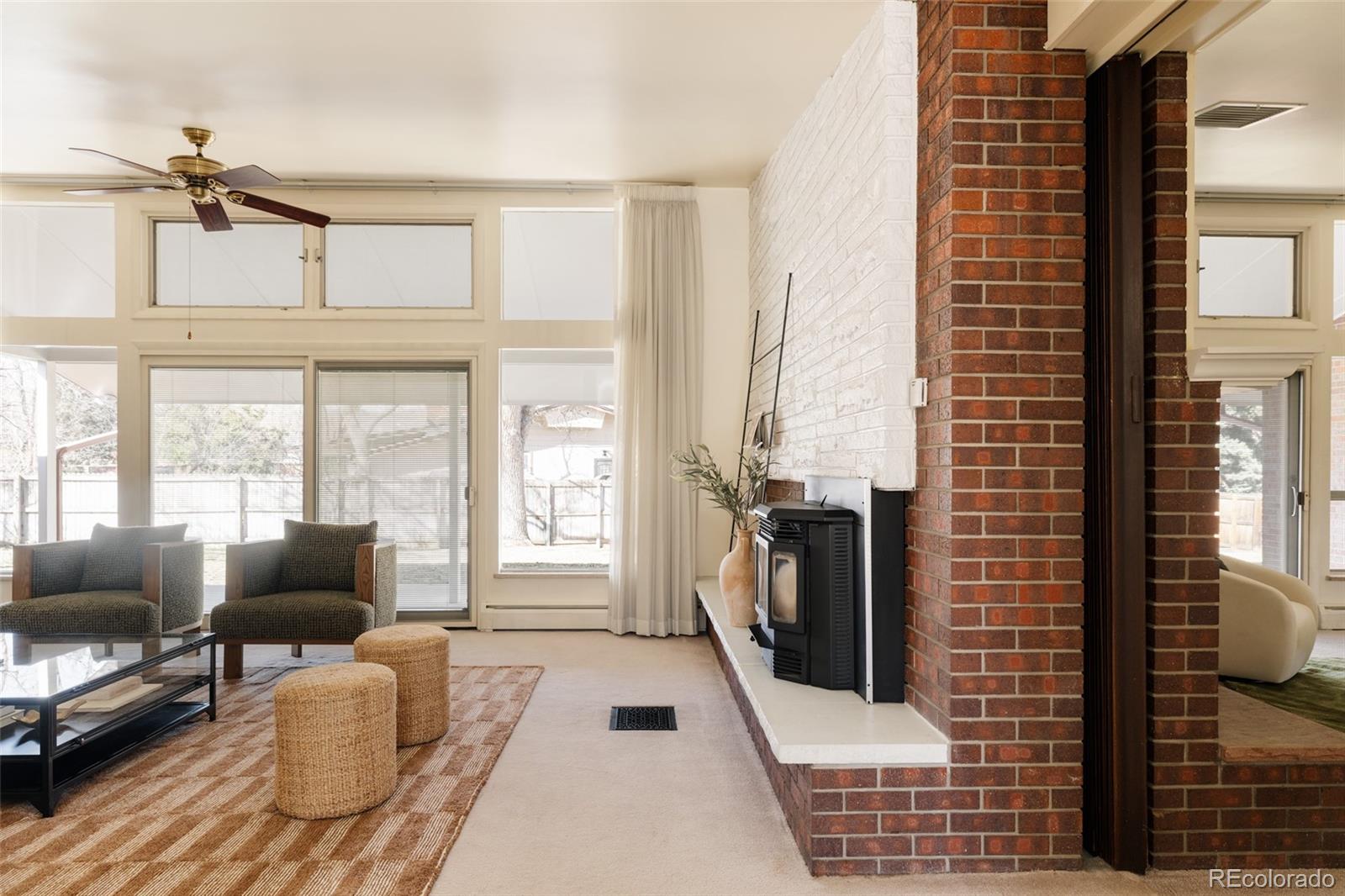 3095 Crabapple Road Golden, CO 80401 - Photo 6 of 50 a living room with furniture and a fireplace