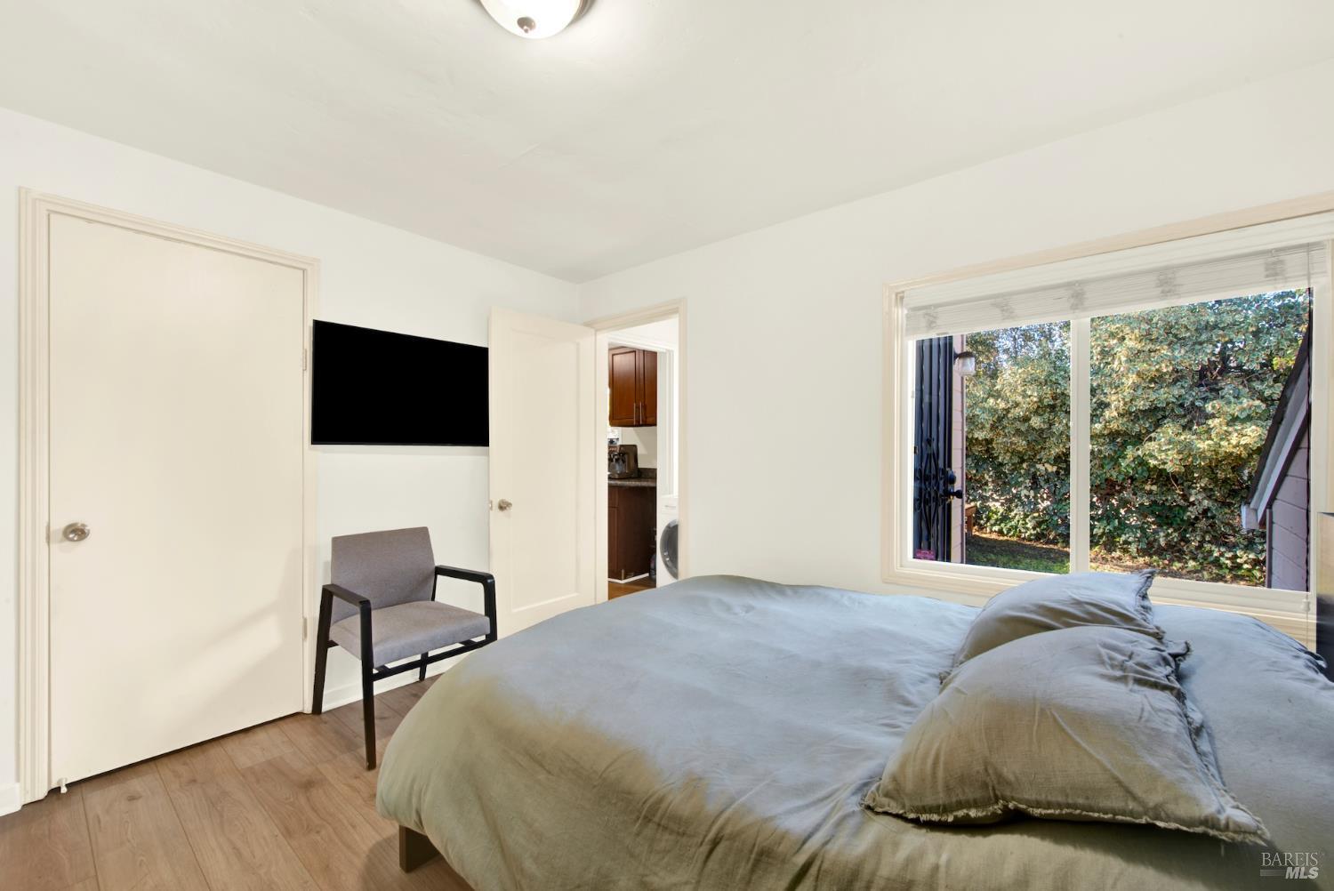 91 14th Street Vallejo, CA 94590 - Photo 29 of 48 a bedroom with a bed and a flat screen tv