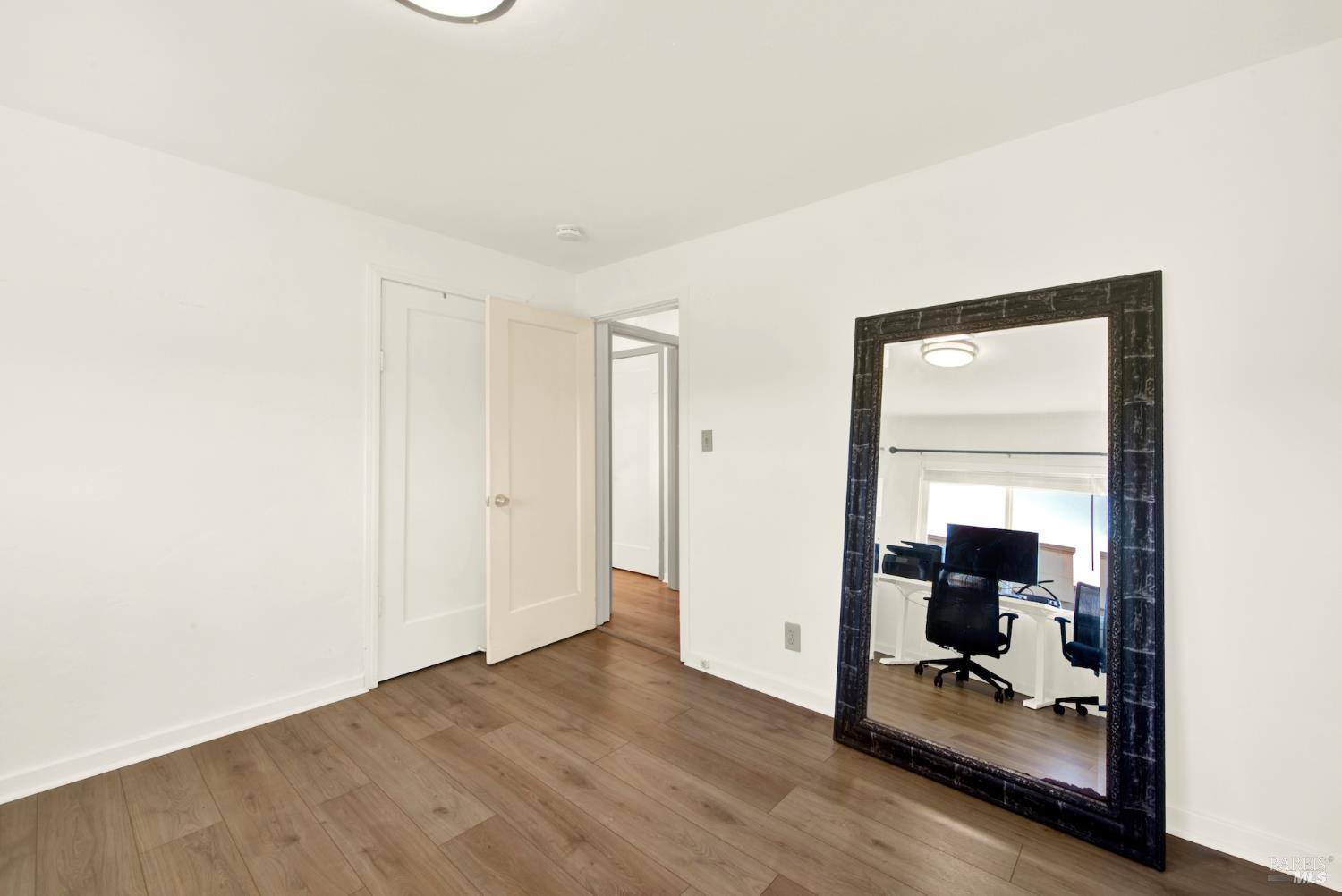 91 14th Street Vallejo, CA 94590 - Photo 35 of 48 a view of a room with wooden floor and bathroom