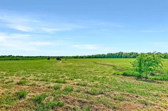 a view of a lake with a city