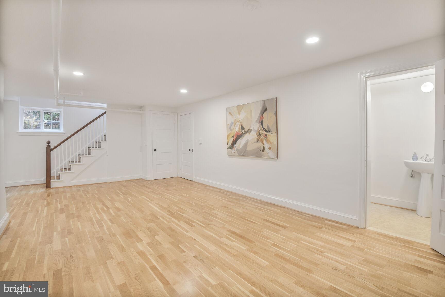 6011 Broad Branch Road Northwest Washington, DC 20015 - Photo 20 of 27 a view of empty room with wooden floor