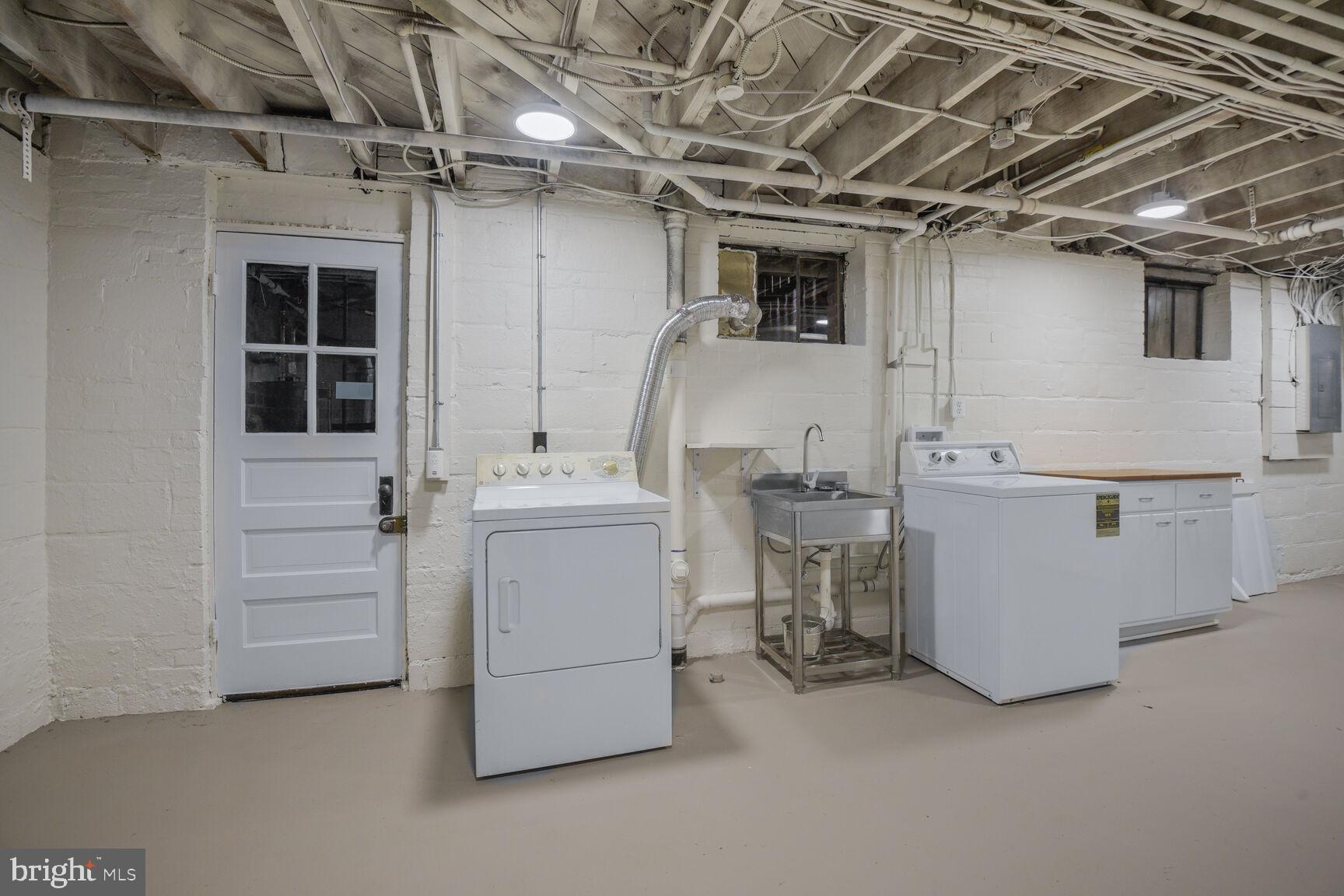 6011 Broad Branch Road Northwest Washington, DC 20015 - Photo 21 of 27 a utility room with dryer and washer