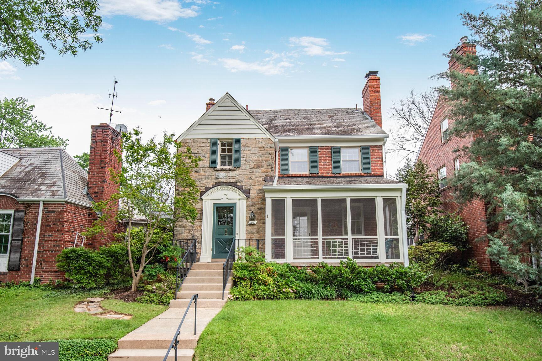 6011 Broad Branch Road Northwest Washington, DC 20015 - Photo 23 of 27 a front view of a house with a yard