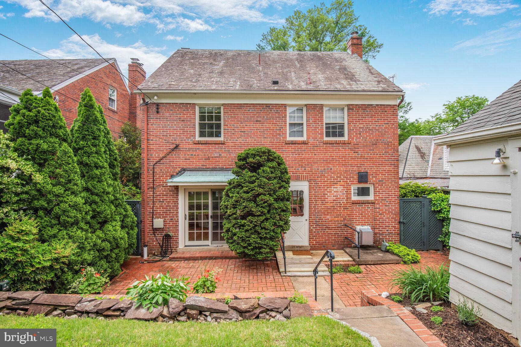 6011 Broad Branch Road Northwest Washington, DC 20015 - Photo 26 of 27 front view of a house with a yard