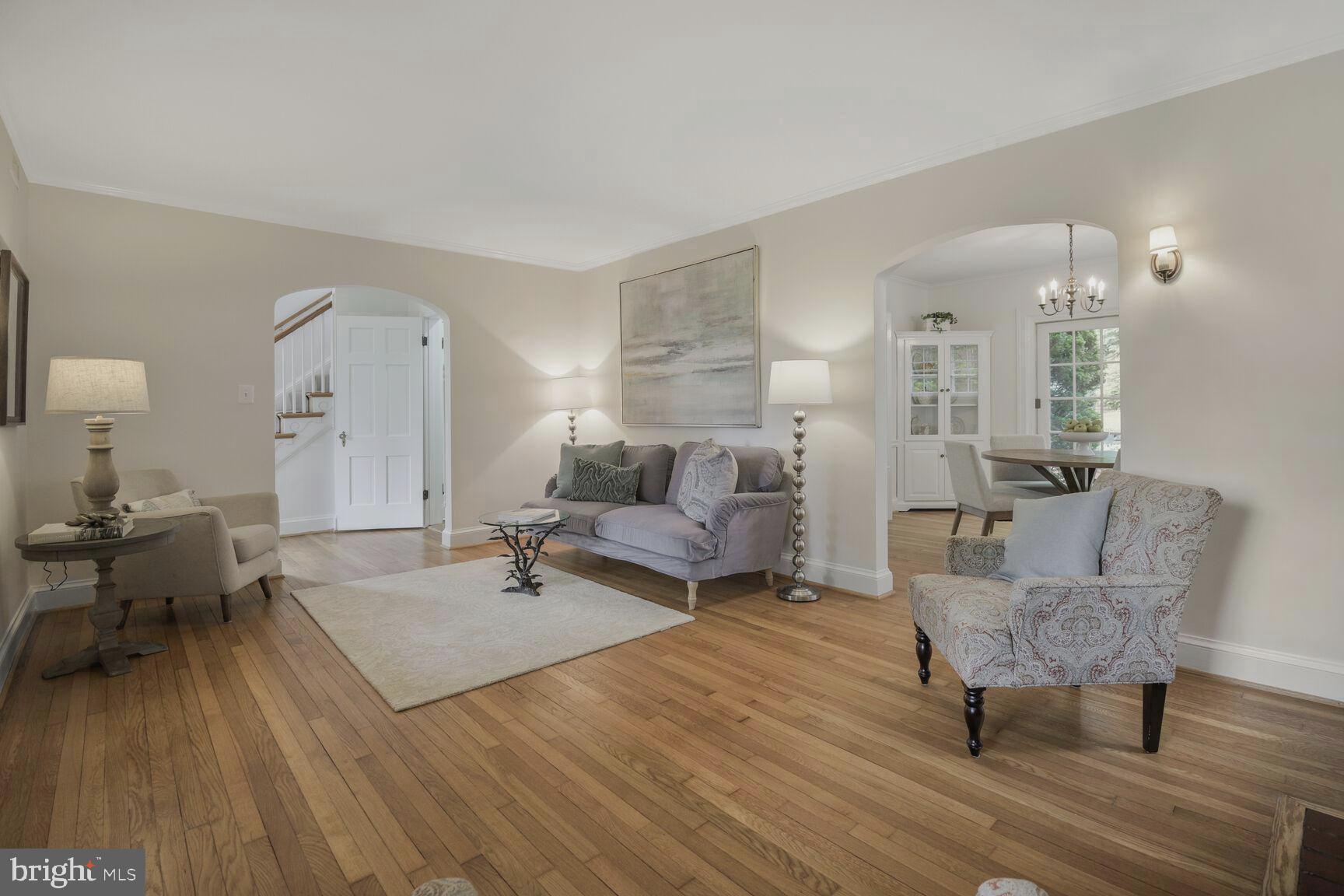 6011 Broad Branch Road Northwest Washington, DC 20015 - Photo 5 of 27 a living room with furniture and a wooden floor