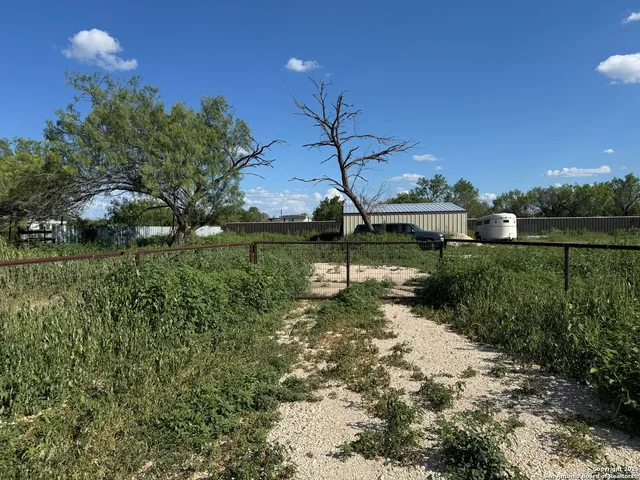 a view of a lake with a big yard