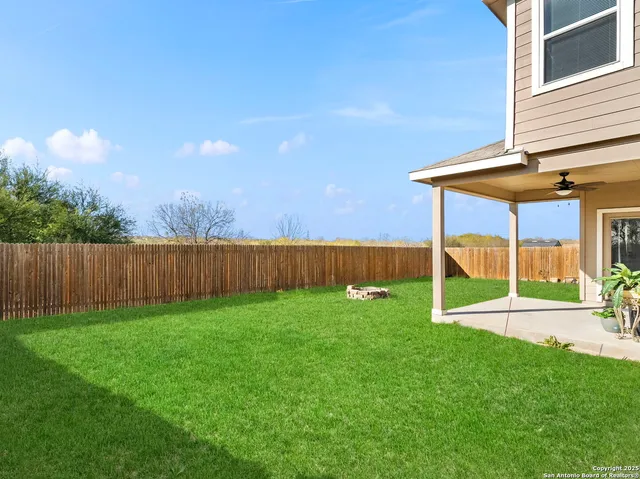 a view of a backyard with a garden