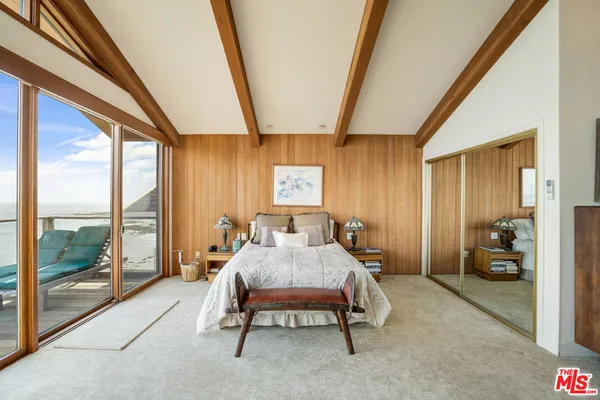 a bedroom with furniture and a couch