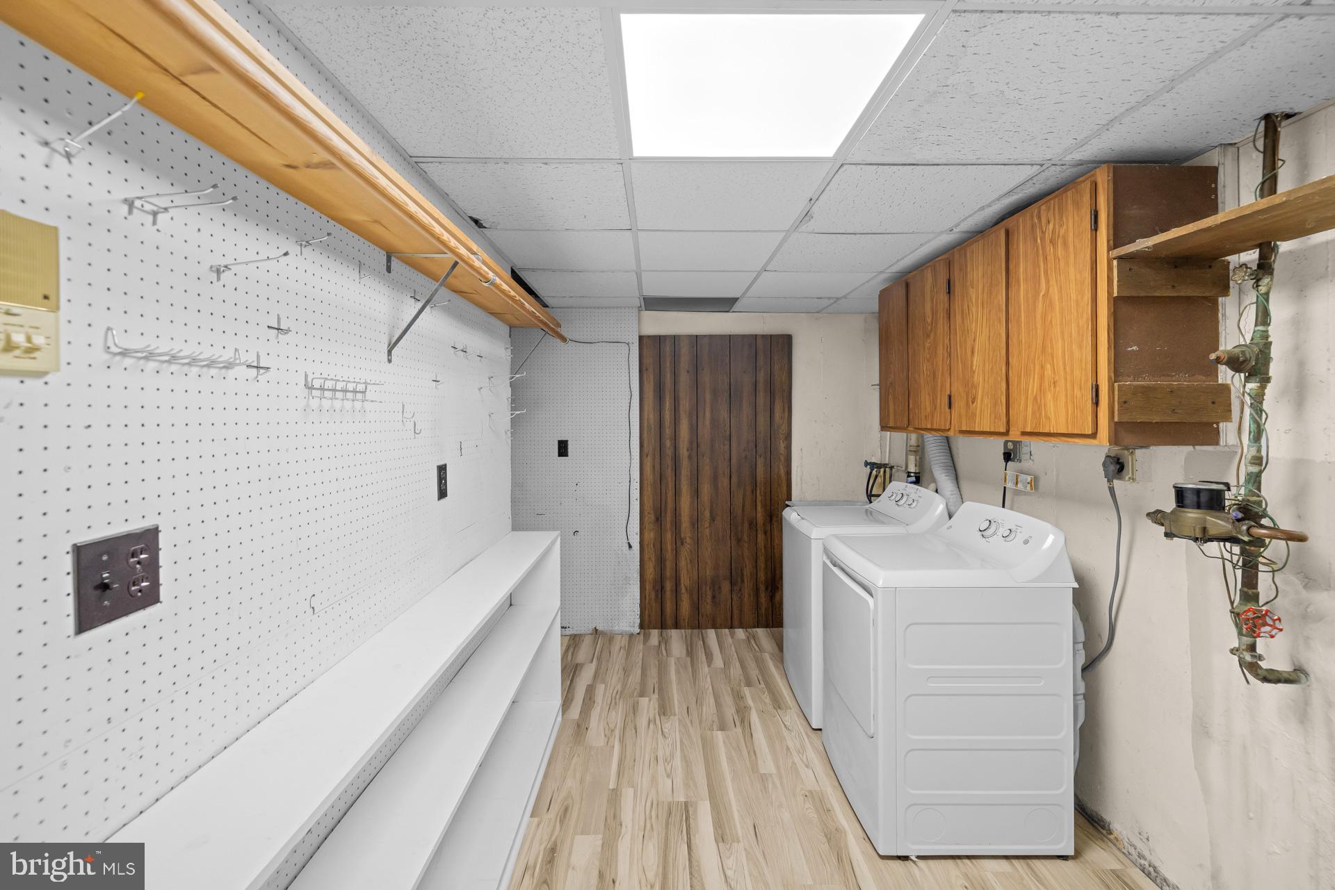 8493 Snowden Oaks Place Laurel, MD 20708 - Photo 34 of 42 Storage and Laundry Room