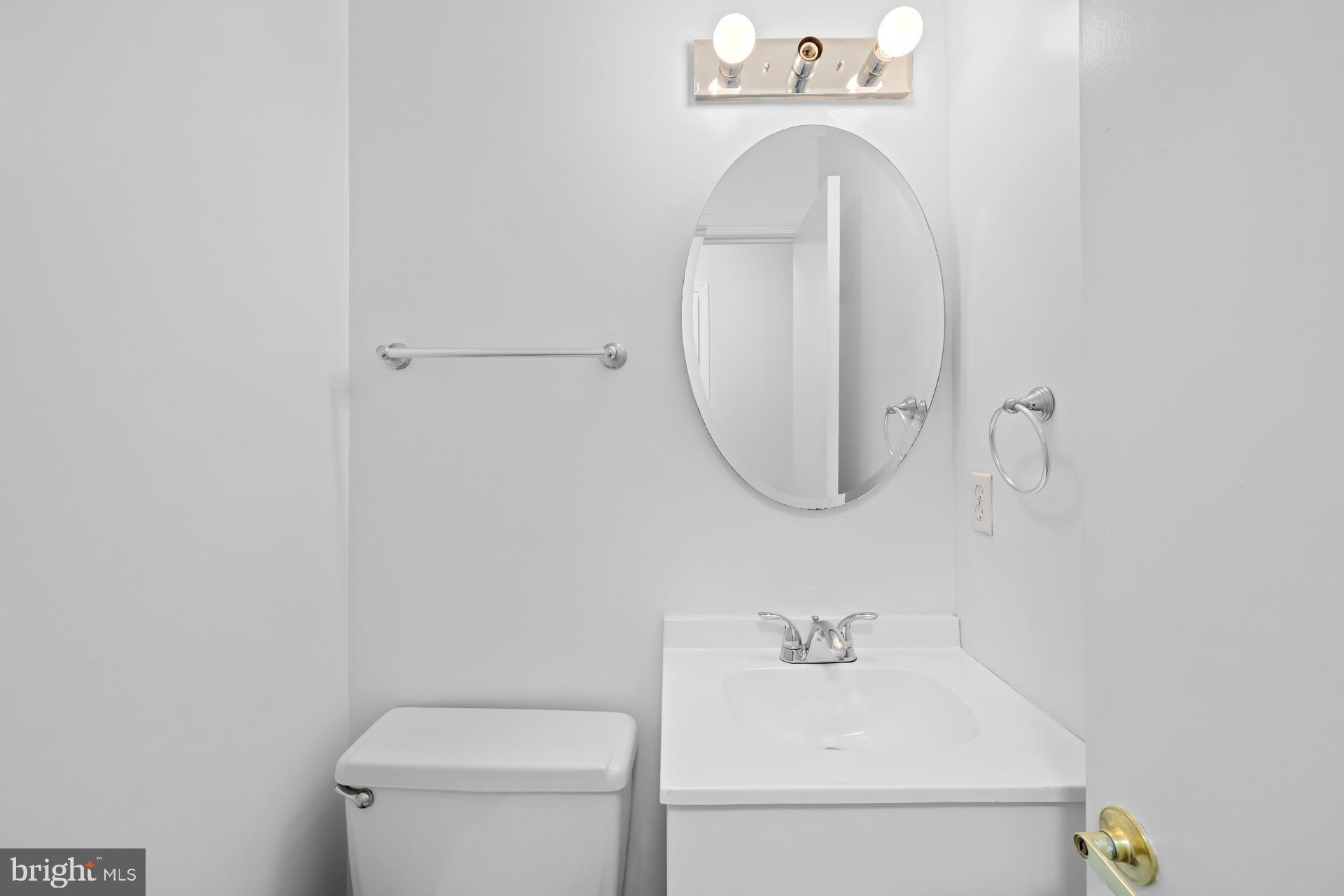 8493 Snowden Oaks Place Laurel, MD 20708 - Photo 9 of 42 Powder Room Main Level