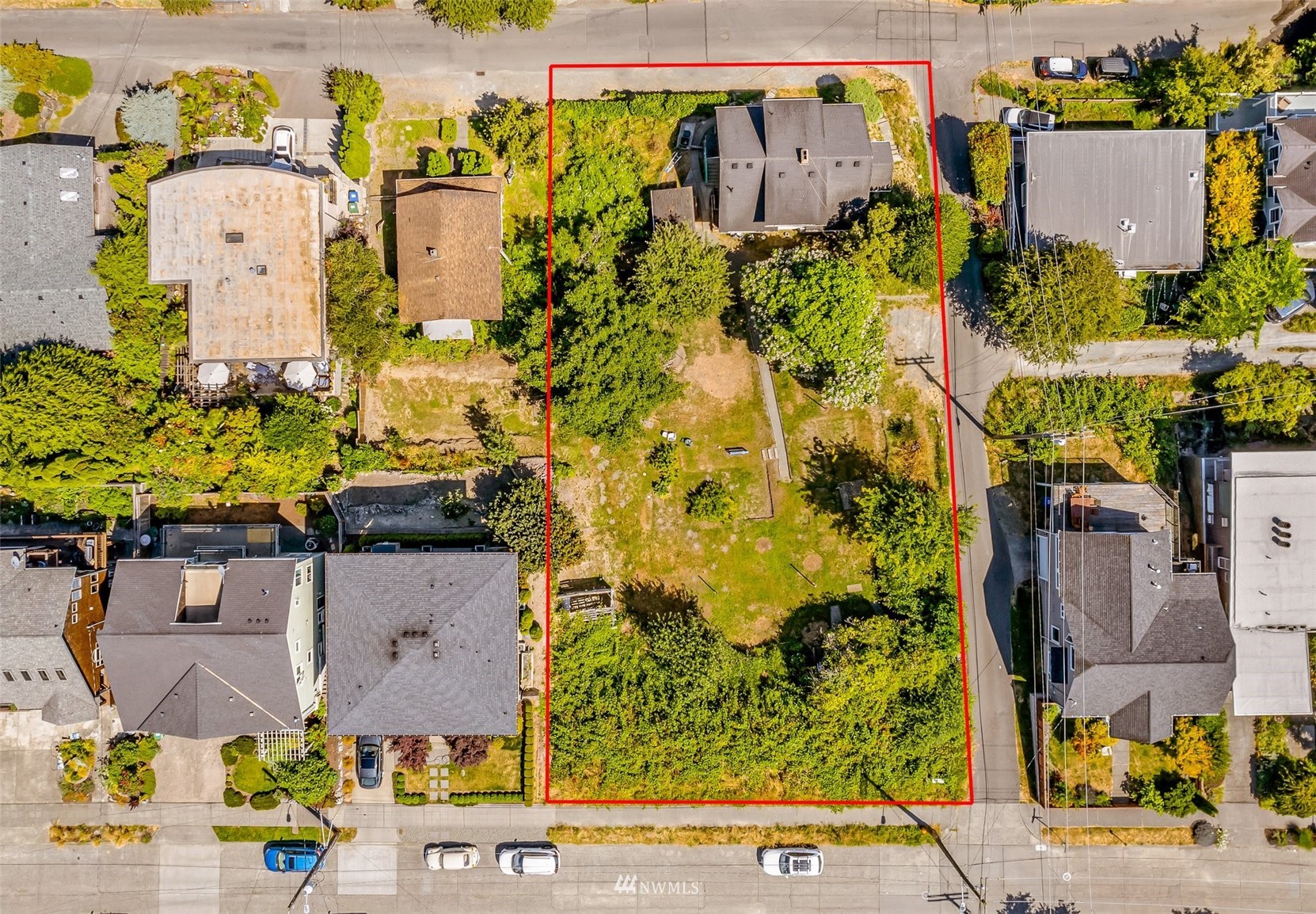 3402 Southwest Spokane Street Seattle, WA 98126 - Photo 3 of 30 an aerial view of residential houses with outdoor space