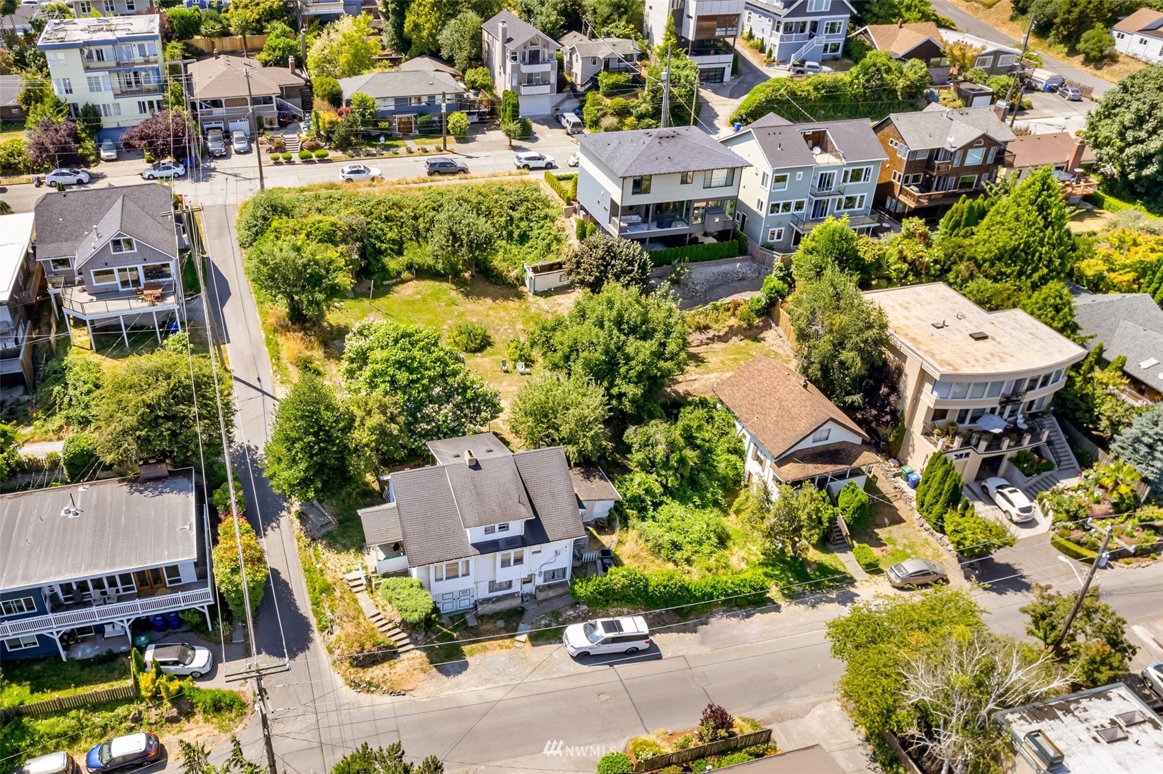 3402 Southwest Spokane Street Seattle, WA 98126 - Photo 4 of 30 an aerial view of multiple houses with yard