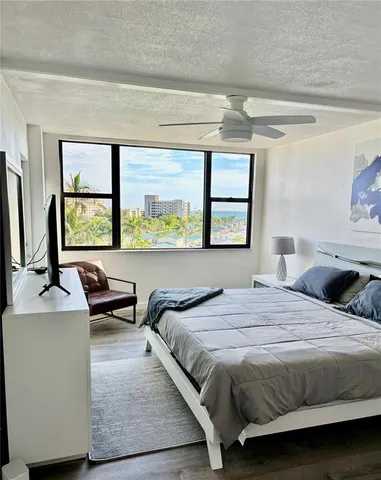 a bathroom with a sink mirror and vanity