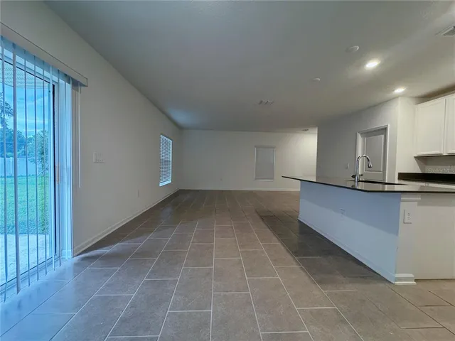 a view of a kitchen with a sink and dishwasher