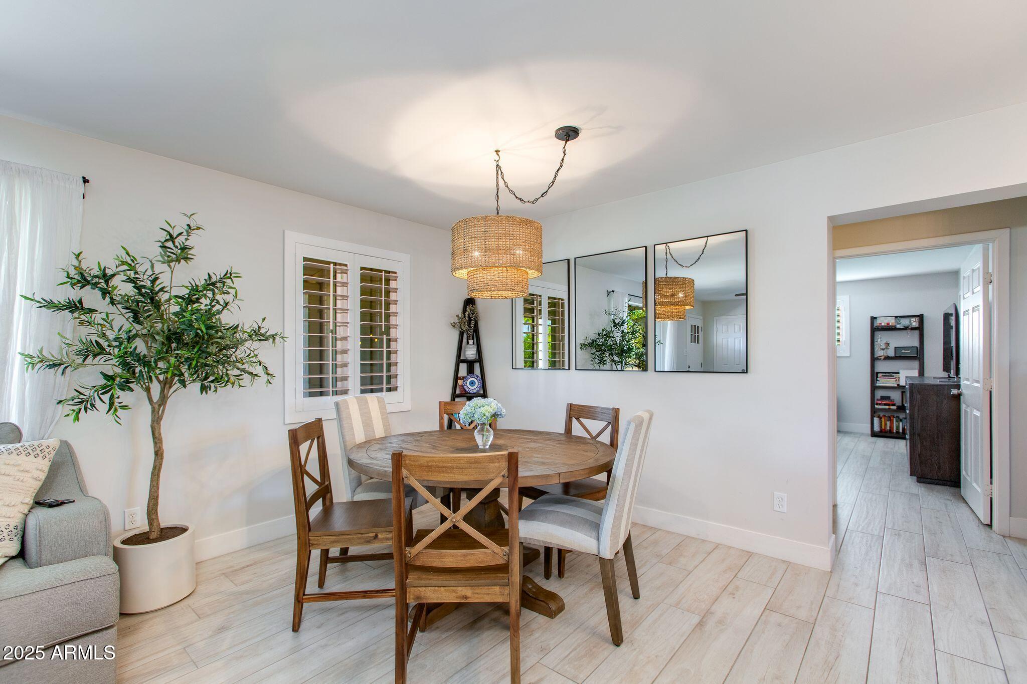 913 West Missouri Avenue Phoenix, AZ 85013 - Photo 11 of 38 a view of a dining room with furniture and window