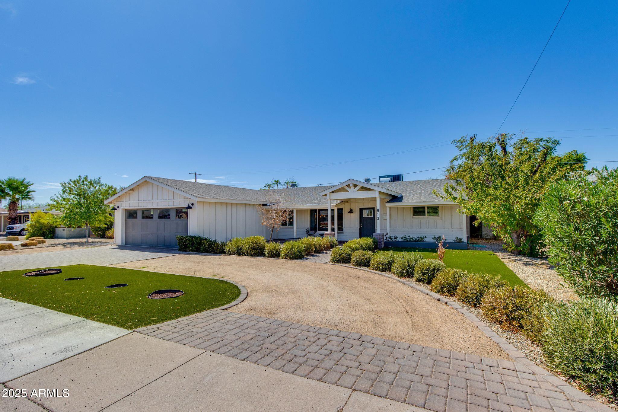 913 West Missouri Avenue Phoenix, AZ 85013 - Photo 3 of 38 a house view with a garden space