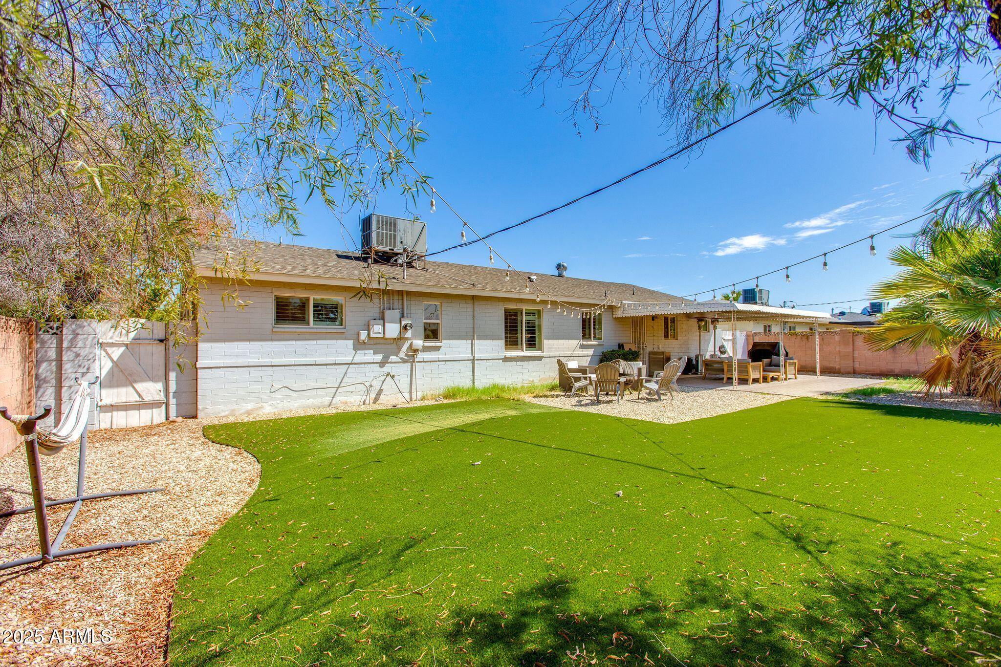 913 West Missouri Avenue Phoenix, AZ 85013 - Photo 35 of 38 a view of swimming pool with outdoor seating