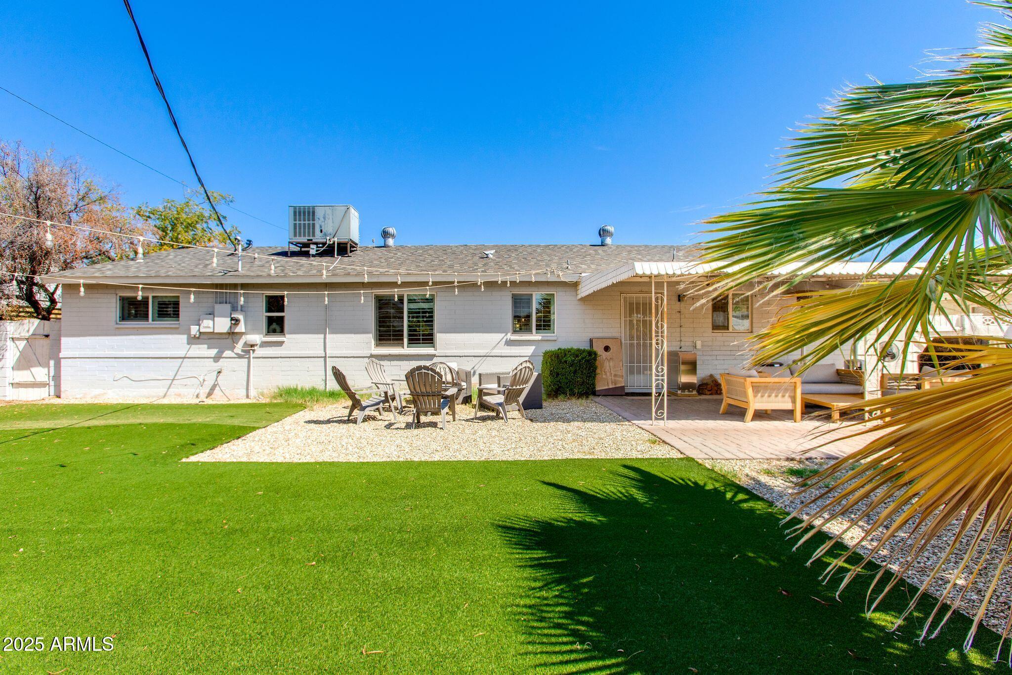 913 West Missouri Avenue Phoenix, AZ 85013 - Photo 36 of 38 a view of a house with backyard porch and sitting area