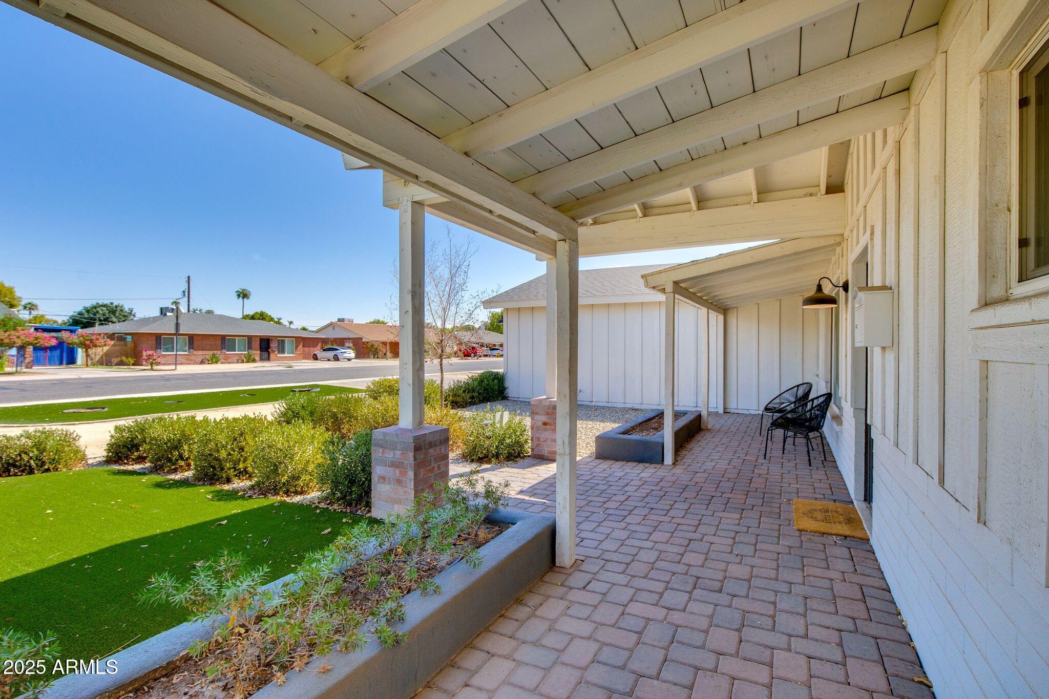 913 West Missouri Avenue Phoenix, AZ 85013 - Photo 5 of 38 a view of swimming pool with a patio and a garden