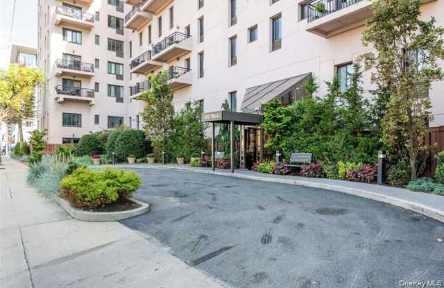 a view of a building with a garden